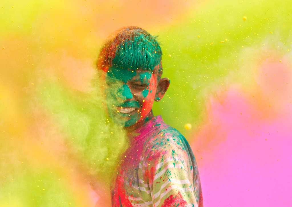 An Indian boy particpating in the Holi festival of colours